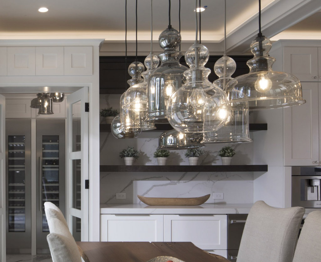 A cluster of Staunton pendants featured in the 2017 New American Remodeled Home by Phil Kean Design Group